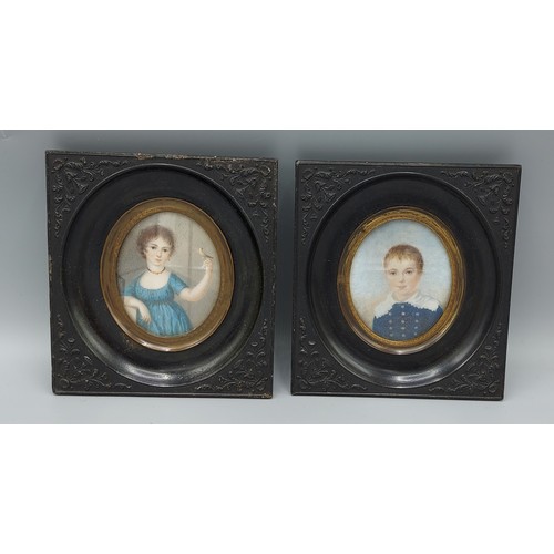 A pair of 19th Century oval portrait miniatures depicting Robert