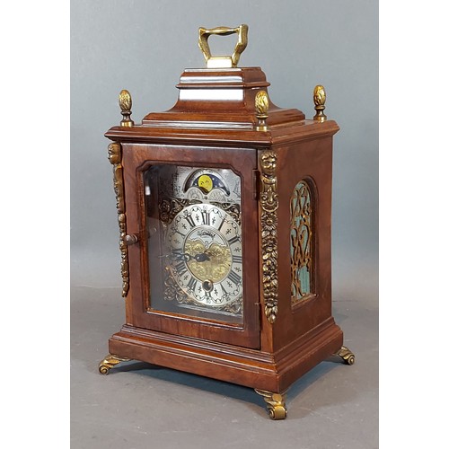 318 - A Warmink walnut cased mantel clock with metal mounts, 26cms tall