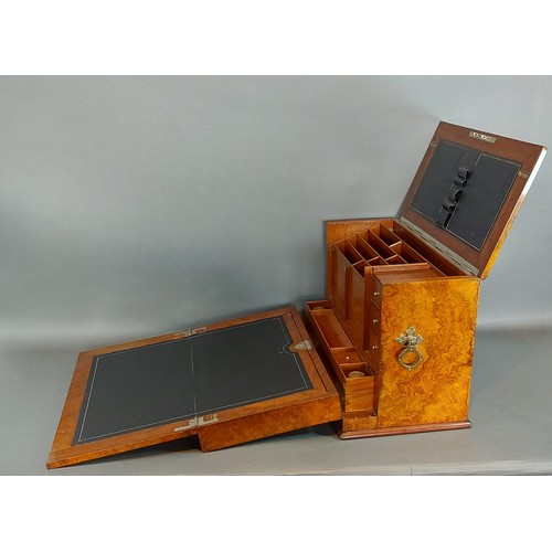 233 - A Victorian burr walnut and brass bound stationary box with fold out writing slope, 41cms wide, 23cm... 