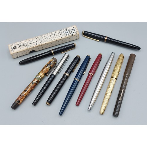 234 - A gold plated Parker fountain pen, together with seven other Parker fountain pens, a Conway 106 foun... 