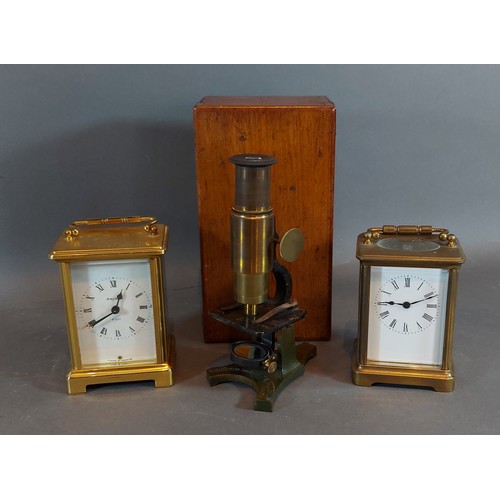 319 - A brass cased carriage clock with lever escapement together with another similar and a small brass m... 