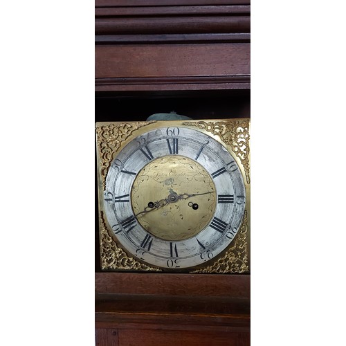 321 - A country oak longcase clock, the square hood above a rectangular door and conforming plinth base, t... 