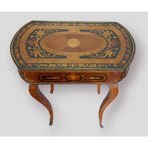 400 - A 19th Century French marquetry inlaid worktable, the hinged top enclosing a divided interior raised... 