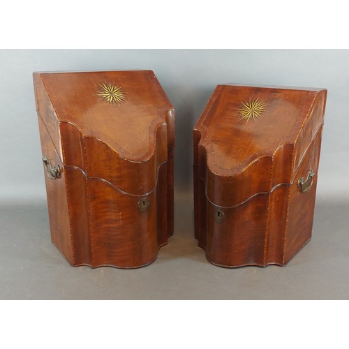 218 - A near pair of Regency knife boxes of serpentine form, each with a star inlaid hinged top enclosing ... 