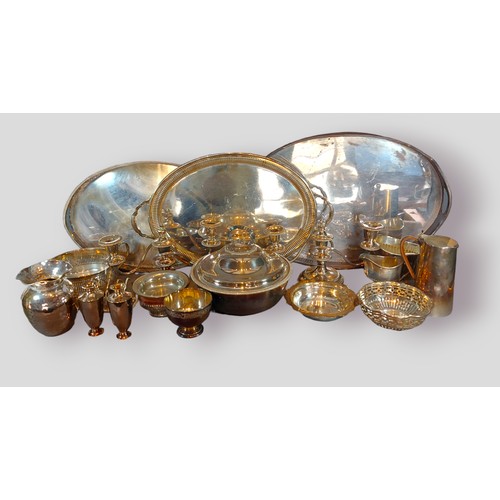 126 - A collection of silver plated items to include an entrée dish, various trays and a pair of candelabr... 