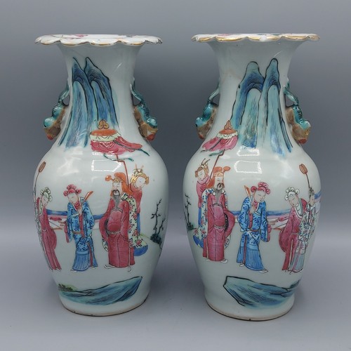 10 - A pair of Canton vases decorated in polychrome enamels and highlighted with gilt with figures fishin... 