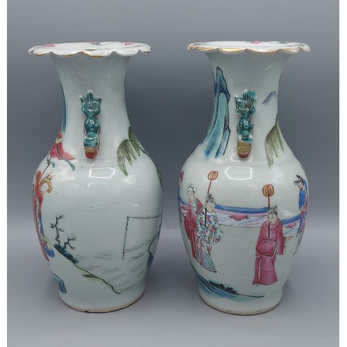 10 - A pair of Canton vases decorated in polychrome enamels and highlighted with gilt with figures fishin... 