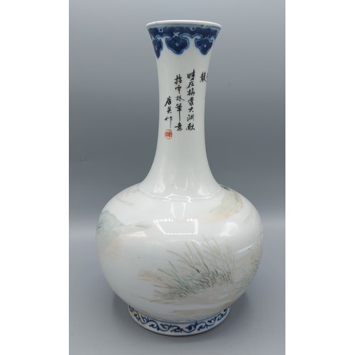 12 - A Chinese porcelain bottle neck vase decorated with a figure in a boat and Chinese script, six chara... 