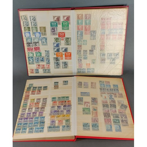 224 - Two red stock books containing Spanish stamps, early 20th Century and later