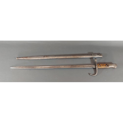 238 - A WWI Turkish bayonet with metal scabbard, 52cm blade