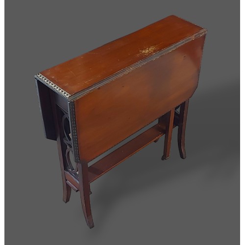 403 - An Edwardian mahogany marquetry inlaid bureau with hinged writing surface above three drawers raised... 