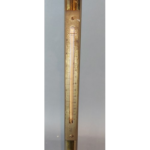 342 - A 19th Century brass ships stick barometer thermometer, with gimble mount, 94cms long