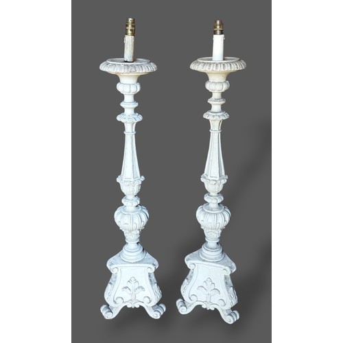 245 - A pair of 18th Century style lamp standards with tri-form bases, 100cms tall together with a set of ... 