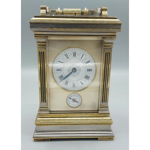 348 - A late 19th or early 20th Century French brass and silvered carriage clock, the painted enamel dial ... 