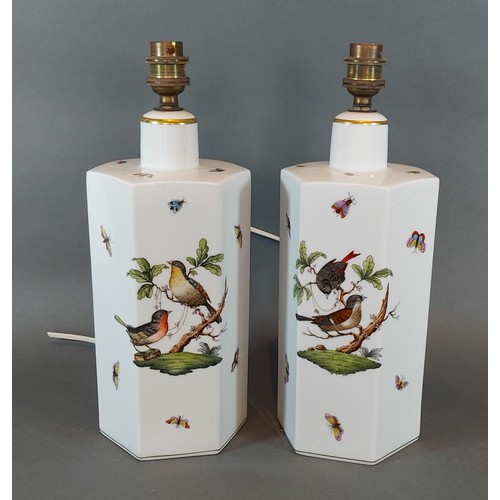 43 - A pair of Herend porcelain table lamps of hexagonal form, handpainted with birds amongst foliage, 32... 