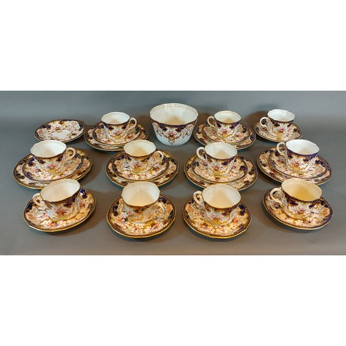 46 - A Royal Crown Derby porcelain tea service comprising eleven cups and saucers, side plates and sugar ... 