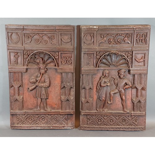 320 - A pair of panels depicting figures, 49cms by 41cms