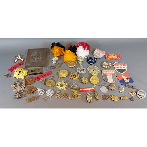 a-collection-of-military-brass-badges-together-with-a-collection-of