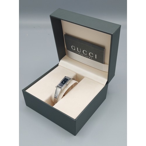 134 - A Gucci 1500L stainless steel cased ladies wristwatch with original box