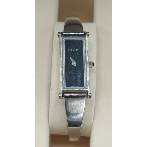 134 - A Gucci 1500L stainless steel cased ladies wristwatch with original box