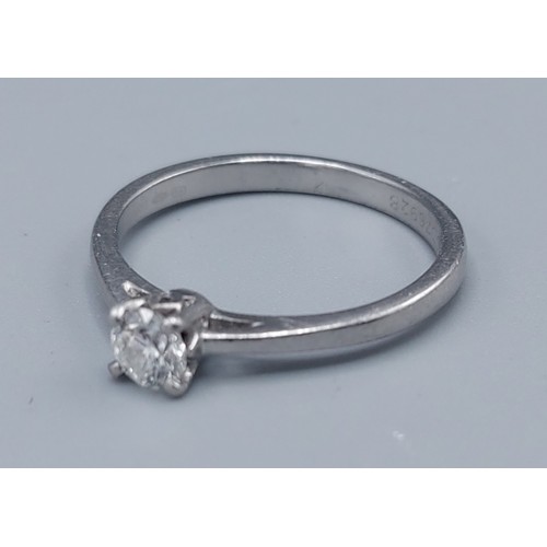 141 - A white metal solitaire diamond ring, 0.33ct, claw set, 3.6gms, ring size O