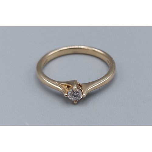 167 - A 9ct gold solitaire Diamond ring, ring size O, 2.2gms