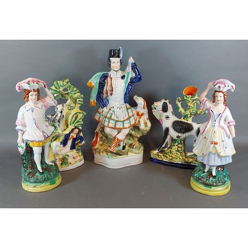 8 - A pair of 19th Century Staffordshire figures together with another similar pair and another similar ... 