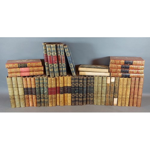 114 - Volumes one to four, Peveril Of The Peak together with a collection of leather bound books