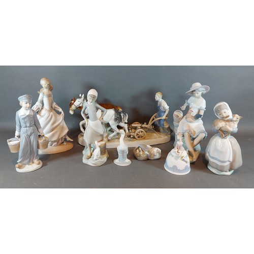 16 - Three Lladro figurines, together with a Lladro bell, two Lladro ducks, two Nao figurines and a conti... 