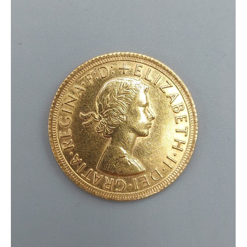 242 - A full gold sovereign dated 1965