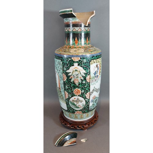 64 - A 19th Century Chinese vase decorated with figures amongst foliage with polychrome enamels highlight... 