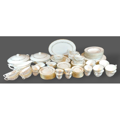 68 - A Royal Worcester Chantilly pattern dinner service comprising dinner plates, tureens, coffee and tea... 