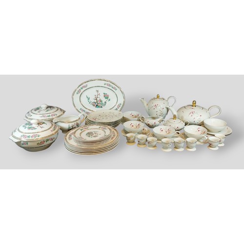 73 - A Wedgewood part dinner service with Indian Tree decoration together with a German breakfast set