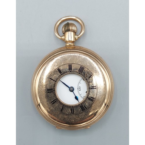 91 - A 9ct gold cased half hunter pocket watch, the enamel dial with Arabic numerals and subsidiary secon... 