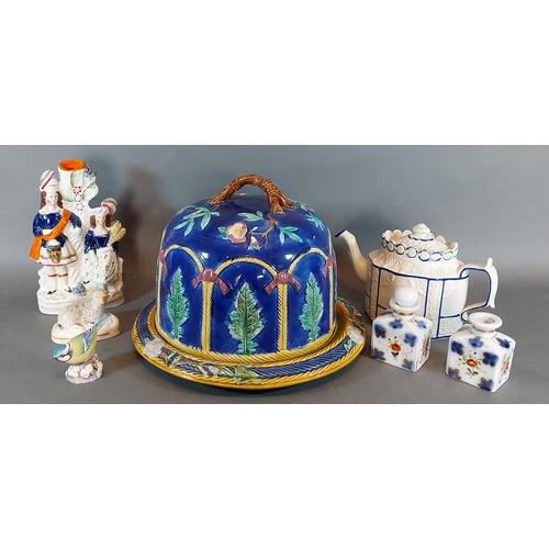 3 - A Majolica cheese dome and stand together with other ceramics to include a salt glazed teapot