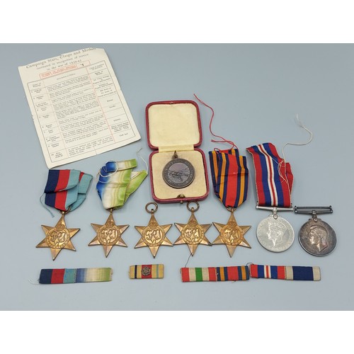 229 - A Second World War Royal Navy group of seven medals to include The 1939-1945 Star, The Atlantic Star... 