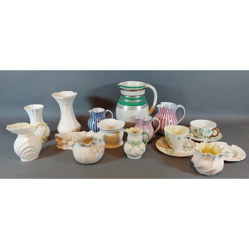 8 - A Radford jug together with three Rye pottery jugs and a collection of Belleek