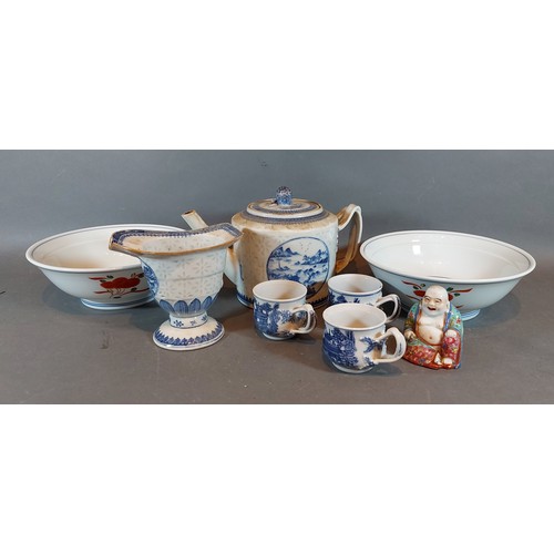 17 - A Chinese underglaze blue decorated teapot together with a pair of Chinese porcelain bowls, a Chines... 