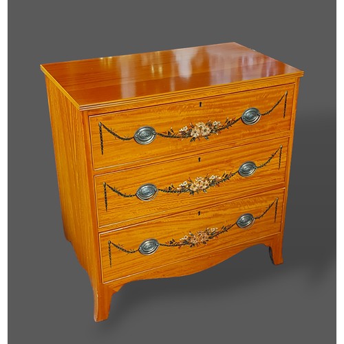 329 - A Sheraton revival Satinwood chest, the reeded top above three drawers painted with bows and swags w... 