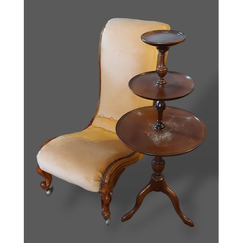 337 - A Victorian walnut low seat chair together with a mahogany three tier dumb waiter