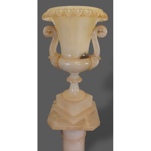 344 - An early 20th Century Alabaster Jardiniere and stand, the two handled jardiniere upon a Torchere, 15... 