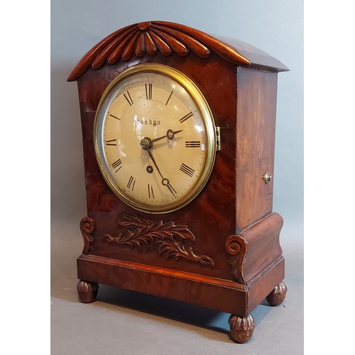 294 - A William IV mahogany cased bracket clock with carved and shaped case,the circular enamel dial inscr... 