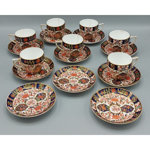 50 - A Royal Crown Derby coffee service comprising seven cups and ten saucers all decorated in the Imari ... 