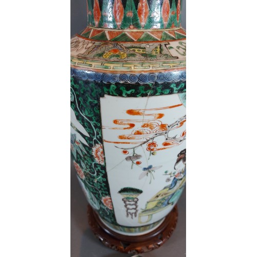 59 - A 19th Century Chinese vase decorated with figures amongst foliage with polychrome enamels highlight... 