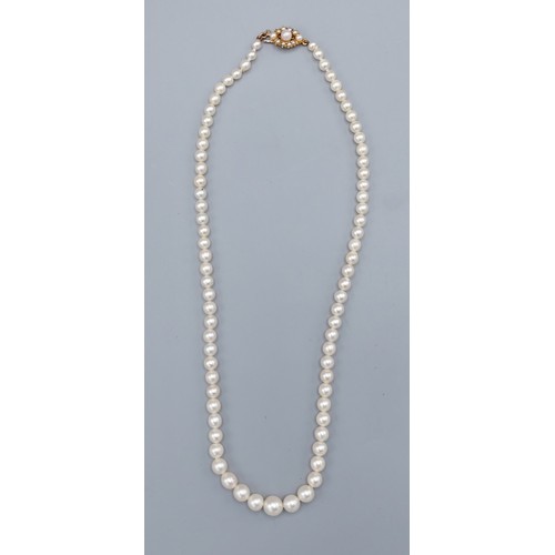 208 - A cultured pearl necklace with 9ct gold pearl set clasp, 45cms long