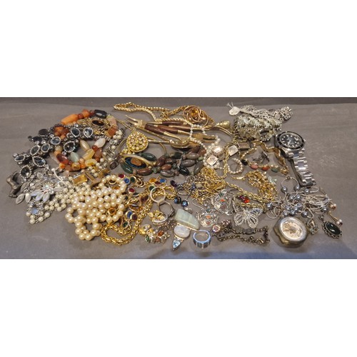 221 - A collection of jewellery to include necklaces, brooches and two watches