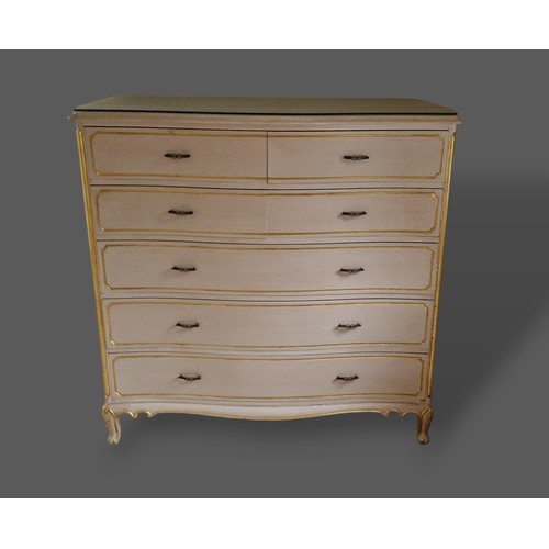 236 - A cream painted bedroom suite, comprising of a chest with four short and three long drawers, a dress... 