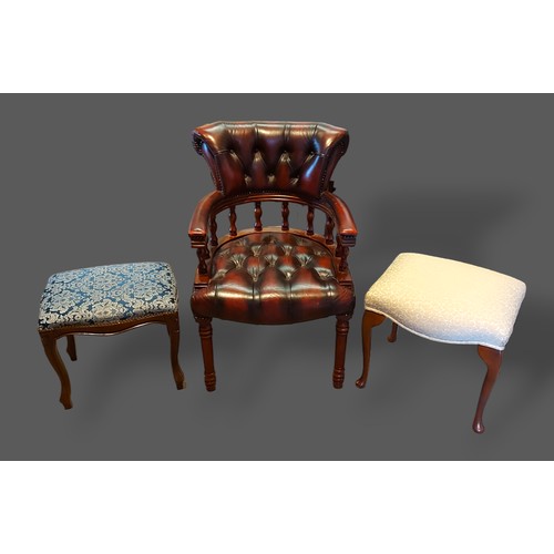 244 - A buttoned leather upholstered office armchair together with two stools