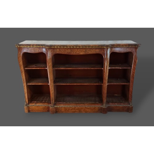 247 - A Victorian walnut, marquetry inlaid and gilt metal mounted bookcase, the moulded top above open she... 