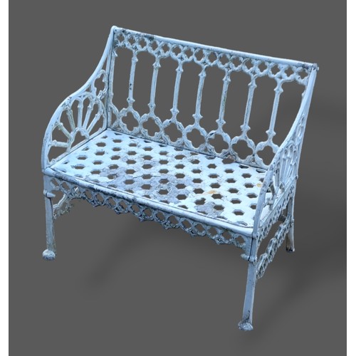 252 - A Gothic style aluminium garden seat of pierced form, 87cms long